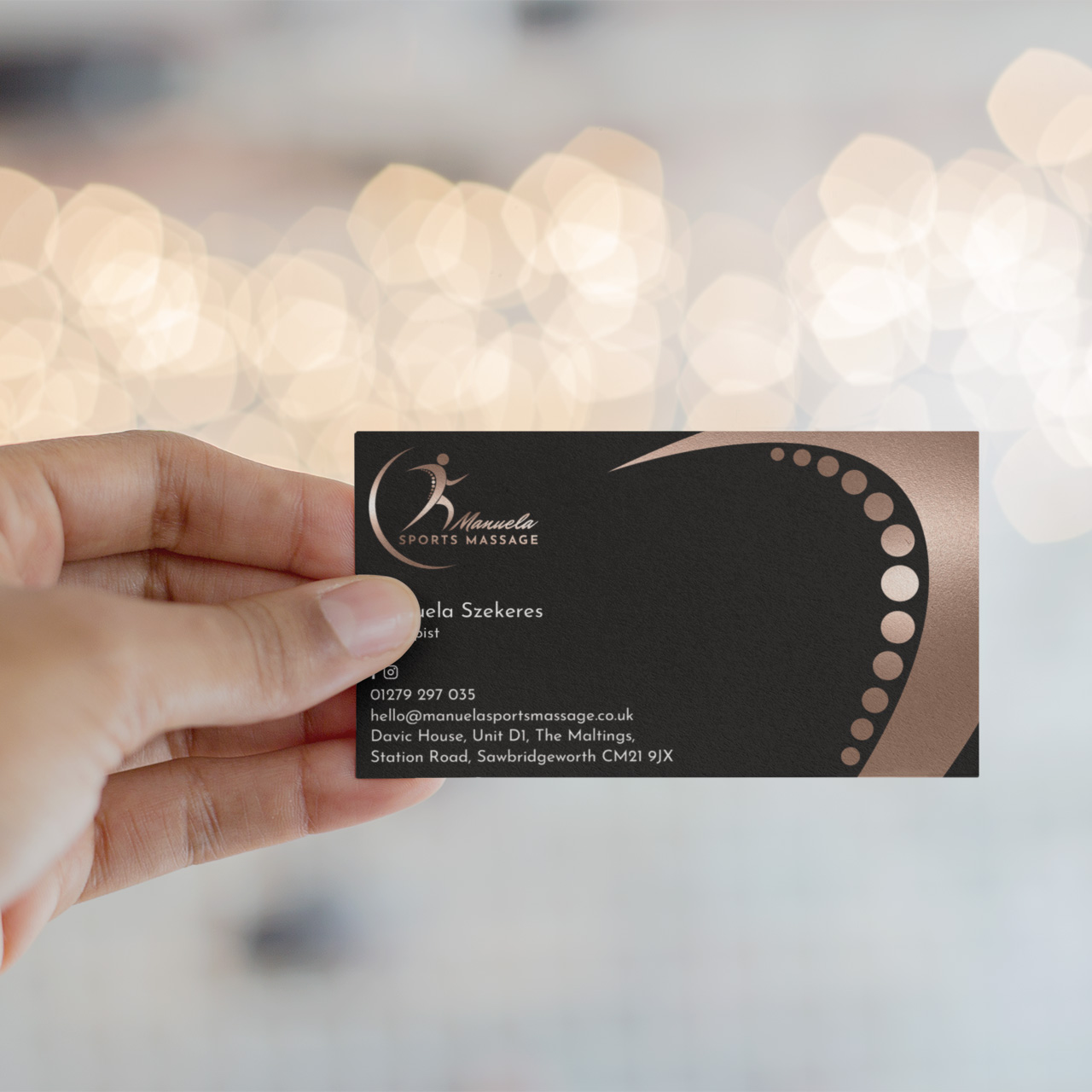 manuela sports massage business card