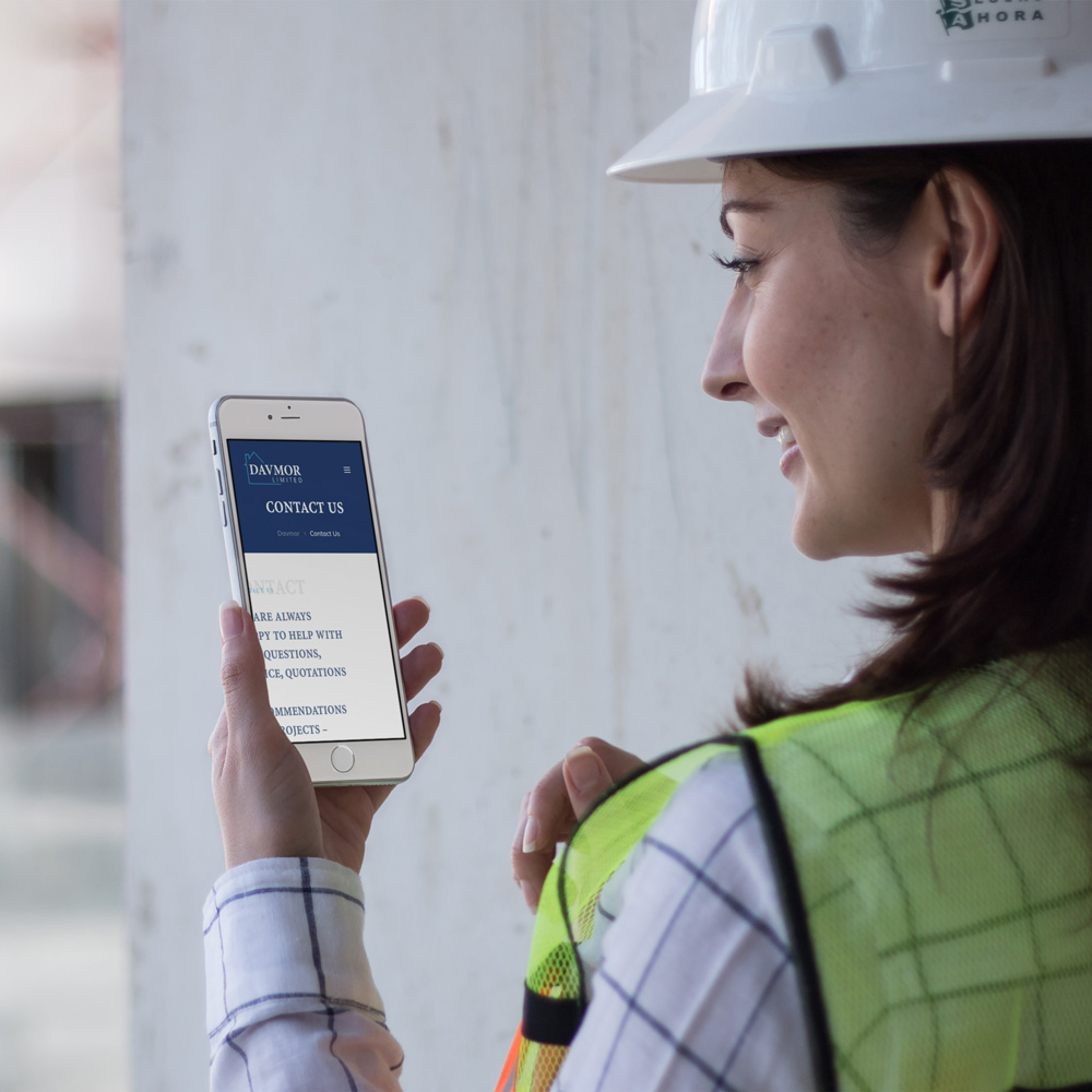 davmor-iphone-mockup-in-portrait-position-of-a-woman-architect-at-the-site-a12579 Davmor website mobile device