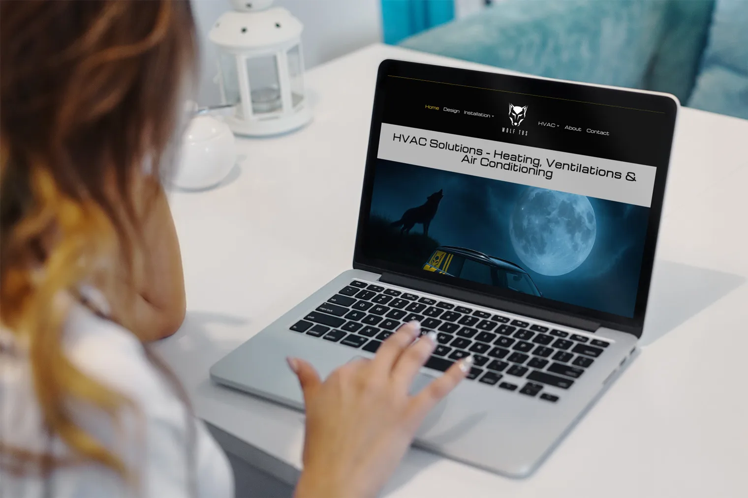 Wolf TBS new website on laptop